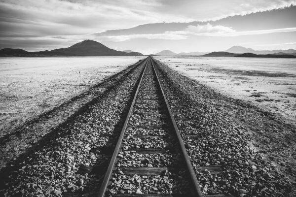 Railway track through a barren wilderness in Bolivia, Leinwanddruck und Poster / canvas print and poster