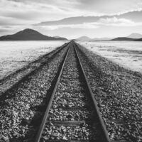 Railway track through a barren wilderness in Bolivia, Leinwanddruck und Poster / canvas print and poster